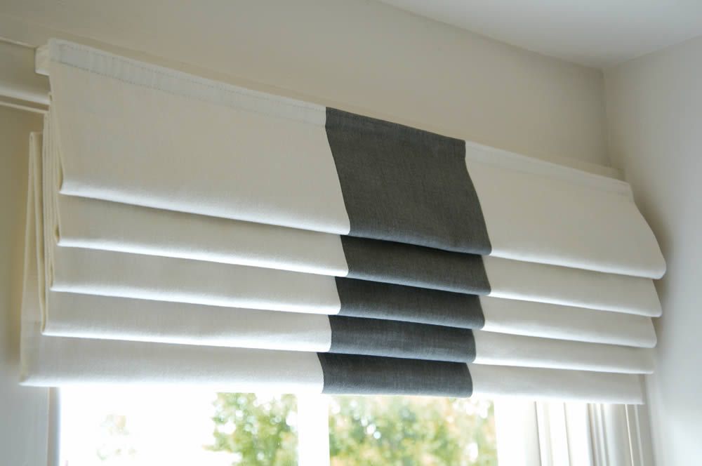 Estor plegable con varillas